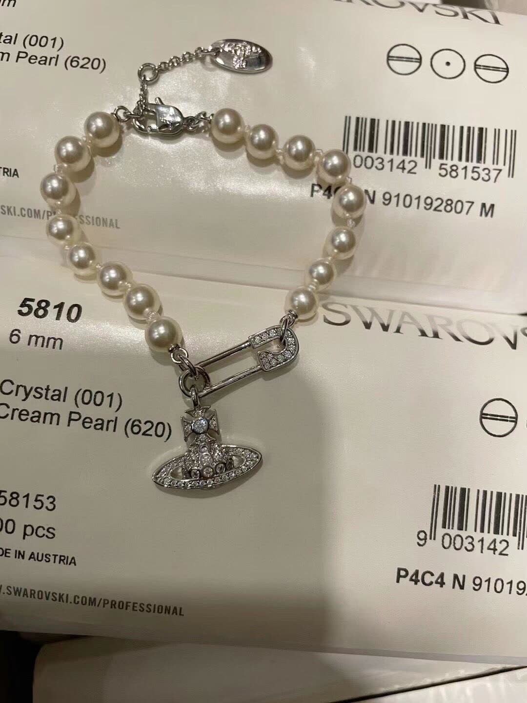 Vivienne Westwood Pearl Bracelet with Orb Charm